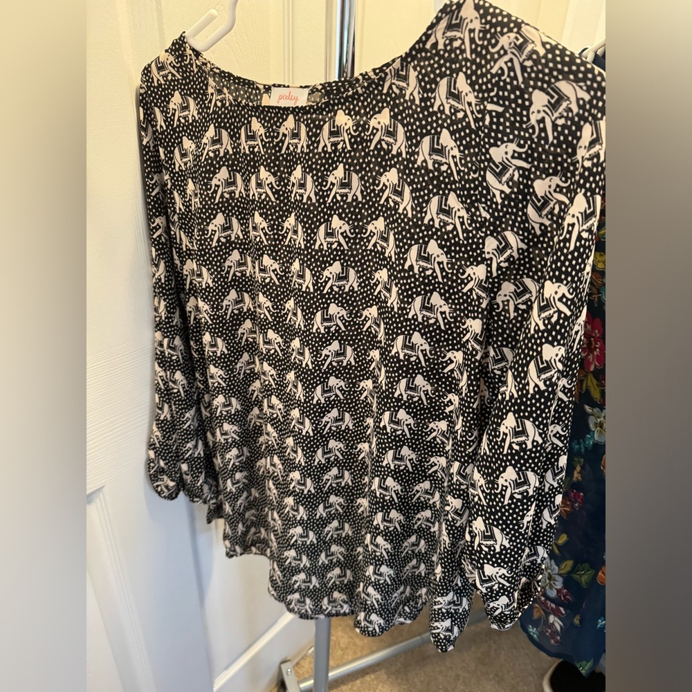 Sheer black blouse with brown elephants